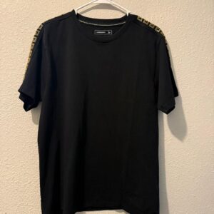 Black Conscience T‑Shirt with Gold Shoulder Trim